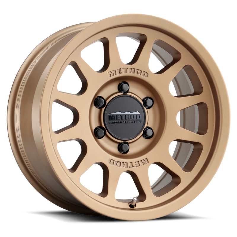 Method MR703 17×8.5 +35mm Offset 6×5.5 106.25mm CB Method Bronze Wheel